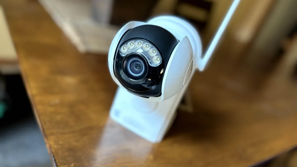 Weatherproof cable sealing with a drip loop under an outdoor camera mount